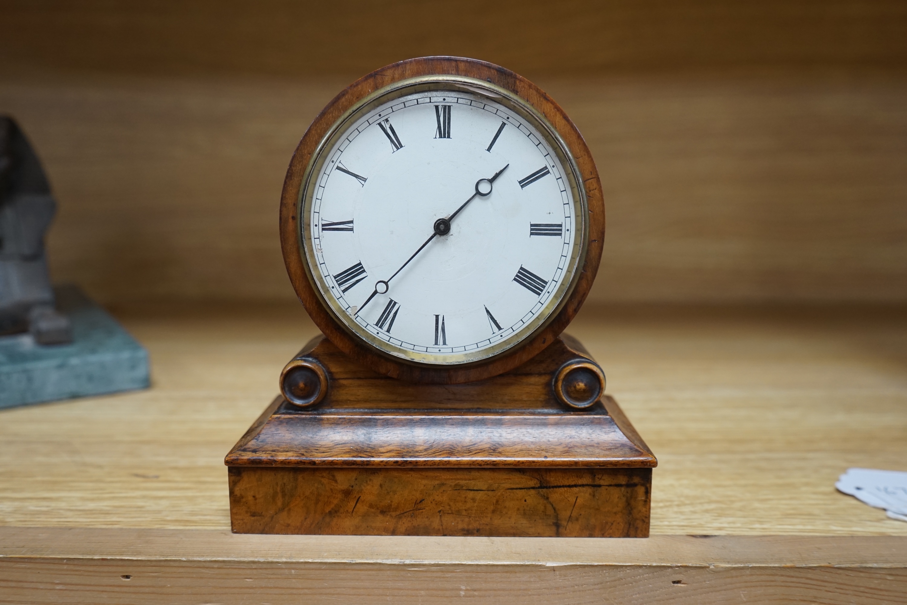 A French tic-tac movement timepiece, 19th century, in a walnut case, 15.5cm high. Condition - fair.